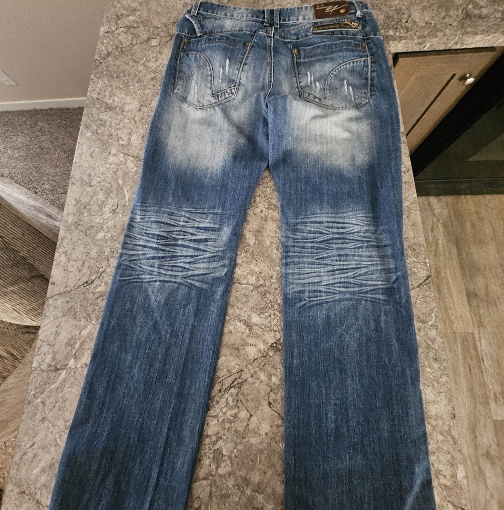 Source Unknown Distressed Blue Jeans